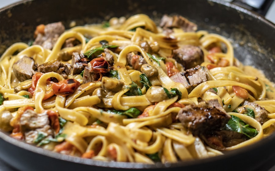 Pappardelle pasta in tomato sauce with pecorino